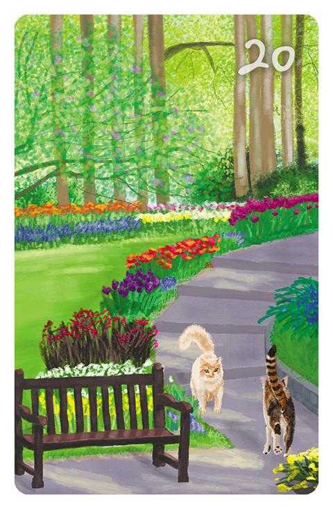 20 Der Park im Magic Cat Lenormand. Zwei Straßenkatzen begenen sich in einem gepflegten Park mit Blumen und einer Parkbank.